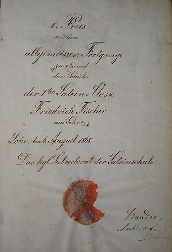 „I. Preis aus dem allgemeinen Fortgange zuerkannt dem Schler der I. Latein-Classe Friedrich Fischer aus Lohr a.M.Lohr, dem 6. August 1868.Das kgl. Subrektorat der Lateinschule: Baader, Subrektor